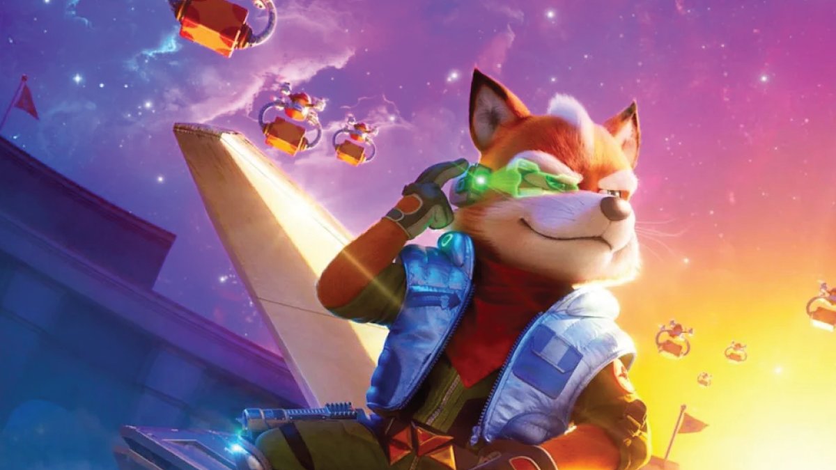 Fox McCloud as he appears in the Super Mario Galaxy movie — wearing his pilot vest and tinted goggles against a vibrant purple-orange sky